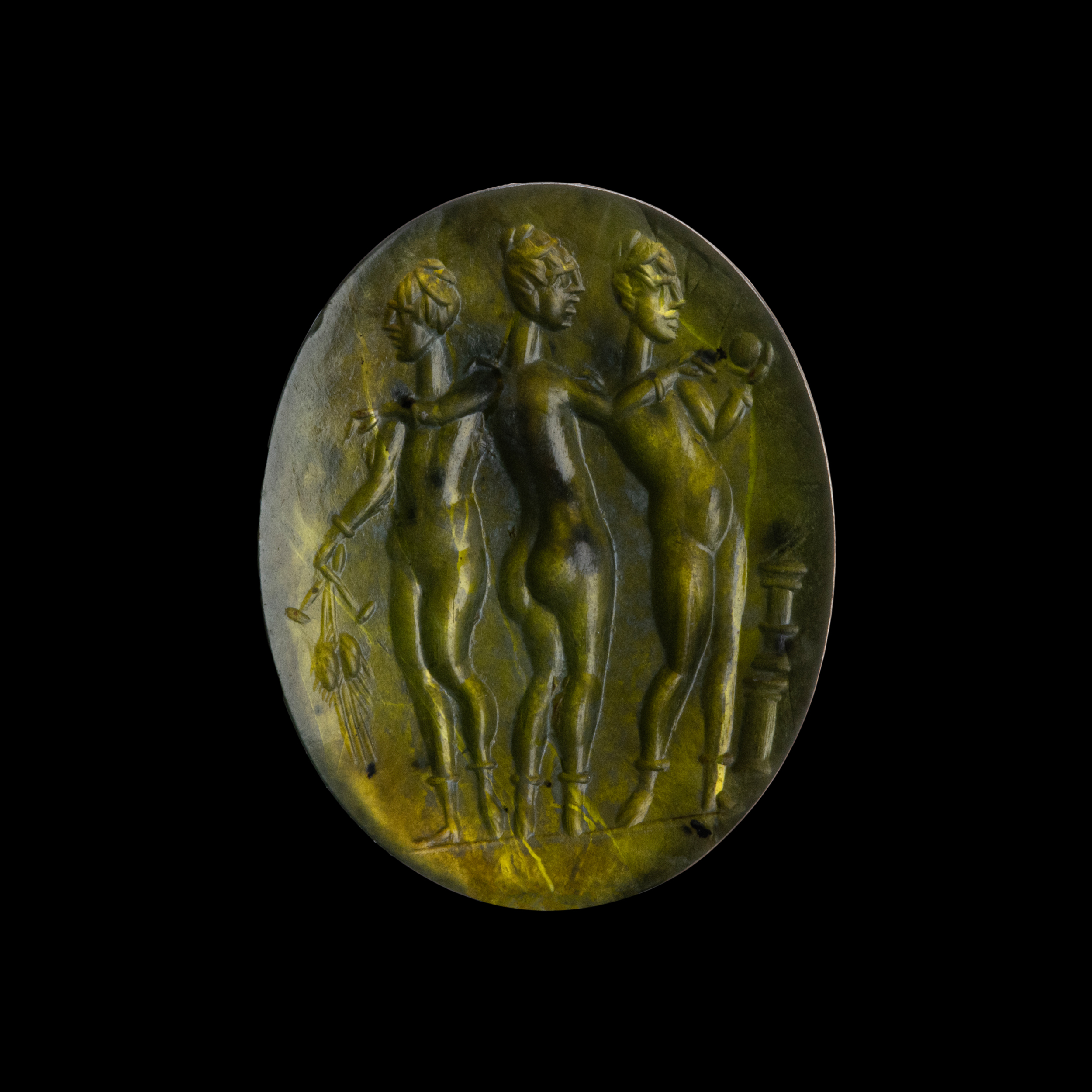 A large Roman green chalcedony intaglio. The Three Graces. 
